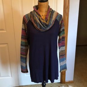 Navy blue tunic top with patterned sleeves and cowl neck